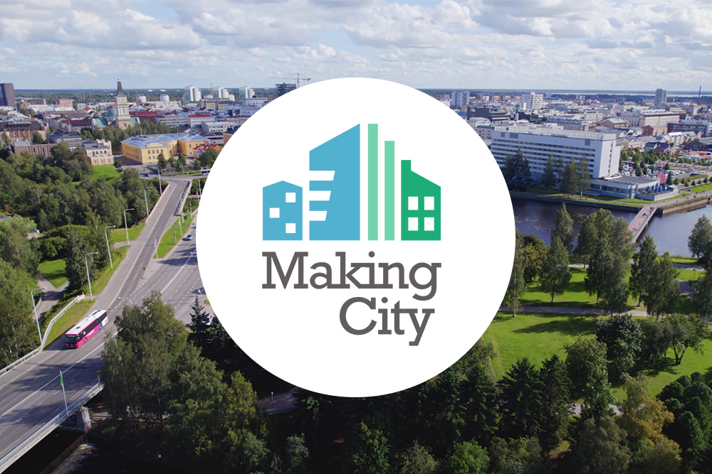 Ilmakuvaa Oulun torinrannasta ja päällä Making City -logo